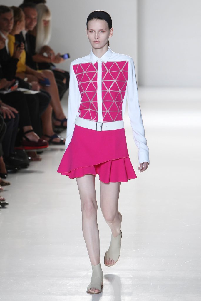 Victoria Beckham uses pops of fuchsia for effect. Victoria Beckham uses pops of fuchsia for effect.